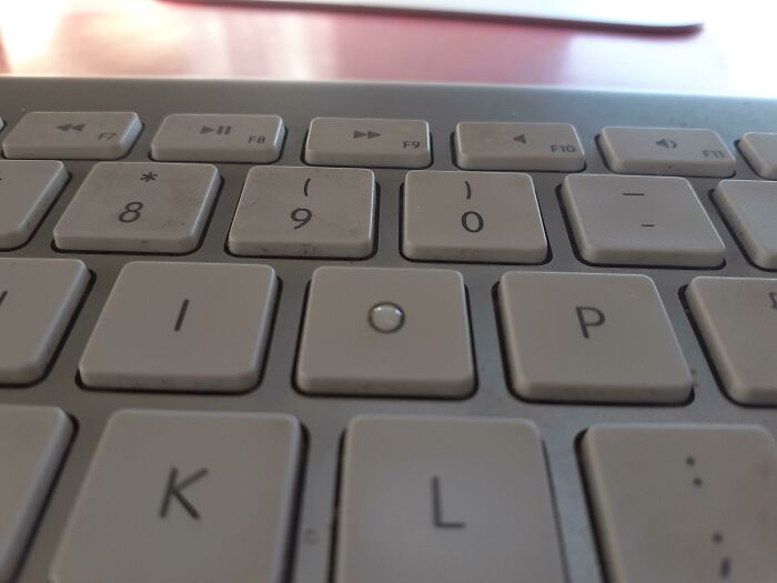 "The Way This Drop of Water Landed Perfectly in My O Key"