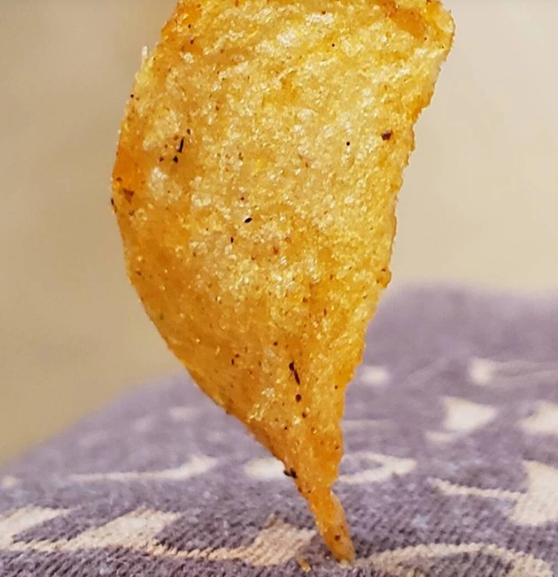 5. "I managed to drop a chip, and it ended up sticking to my shirt in a rather unconventional fashion."