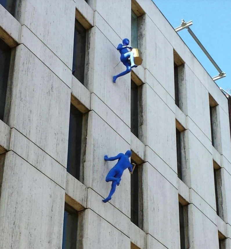 4. "This building was adorned with peculiar blue figures clutching musical instruments."