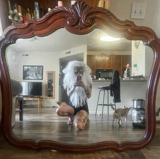 12. The mask wasn't enough. We can see the tattoos.