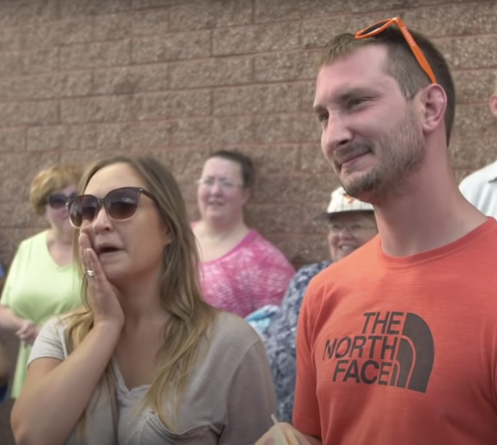 The first glimpse of their new dogs deeply touches the new owners' hearts.