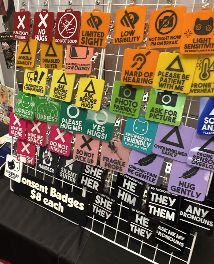 "This Rack Of Consent Badges At A Furry Convention"