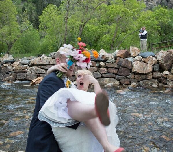 9. “When My Husband Thought It Was A Good Idea To Pick Me Up While Standing Dangerously Close To The Creek After Our Wedding”