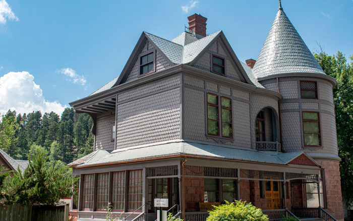 Adams House: after owner W.E. Adams suffered a stroke in the home, his wife reported hearing him walking the halls and moved out, leaving the Victorian mansion frozen exactly as it was, the kind of preserved time capsule that makes historic American mansions so unsettling to walk through