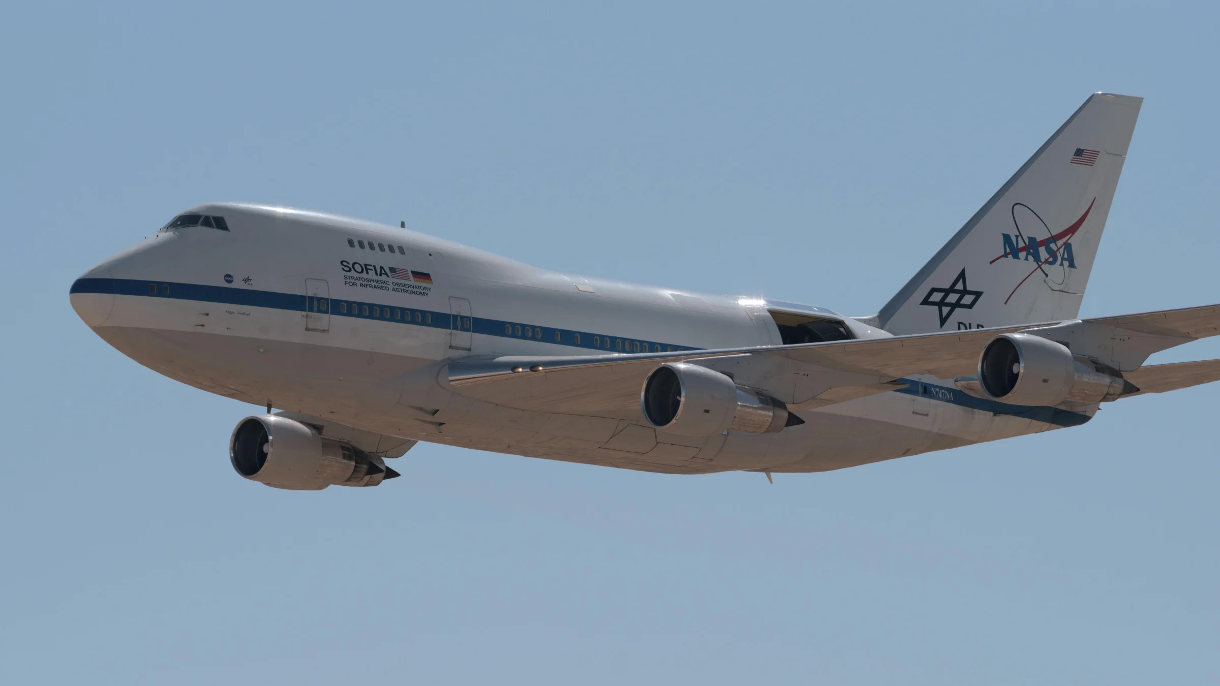 NASA's Stratospheric Observatory for Infrared Astronomy soaring through the sky.