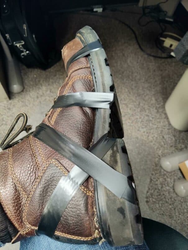 16. "Boot Glue Didn’t Hold, So I’m Making It Through The Day This Way."