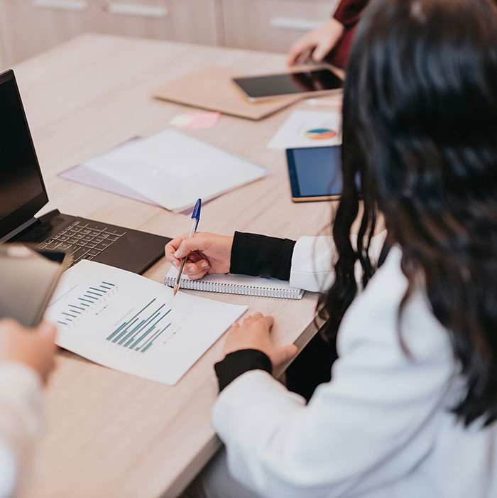 Crunching numbers while dodging drama—office life in full swing!