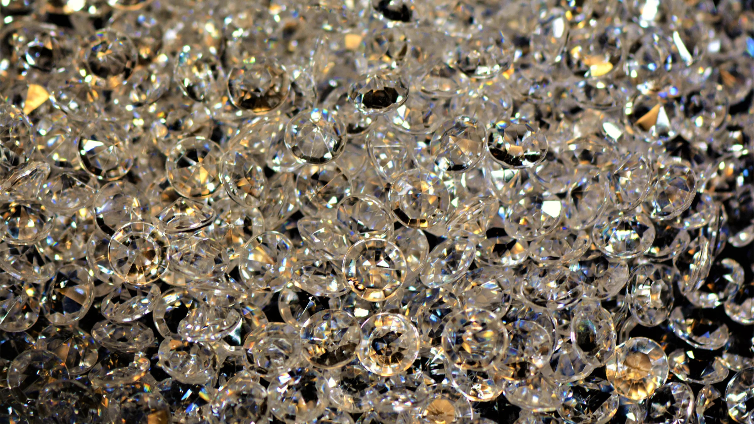 A close-up of a pile of synthetic diamonds.